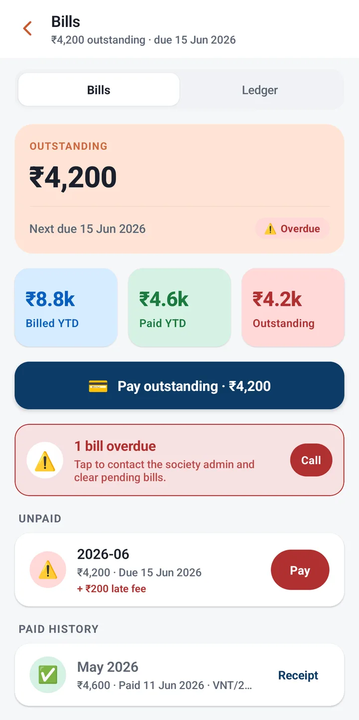 HoodDesk resident app bills screen showing outstanding dues, paid history and pay button
